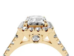 Emerald Cut Diamond Halo Engagement Ring Set in Yellow gold with Pavé Band and Prong-Set Center