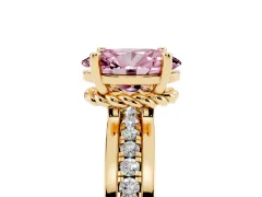 Fancy Pink Oval Cut Diamond Solitaire Ring Set in Yellow gold with Channel Set Band and Prong Setting