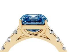 Fancy Blue Asscher Cut Diamond Solitaire Ring Set in Yellow gold with Cut-Down Micro Pavé Band and Prong Setting