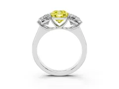 Fancy Yellow Cushion Cut Diamond Three-Stone Ring Set in White gold with Plain Polished Band