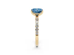 Fancy Blue Radiant Cut Diamond Solitaire Engagement Ring Set in Yellow gold with Round Pavé Band and Prong Setting