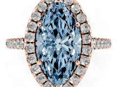 Fancy Blue Marquise Cut Diamond Pavé Halo Engagement Ring Set in Rose gold with Pavé Band and Prong Setting