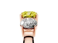 Fancy Yellow Cushion Cut Diamond Three-Stone Ring Set in Rose gold with Round Side Stones and Classic Band
