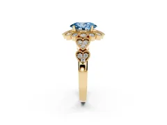 Fancy Blue Oval Cut Diamond Solitaire Ring Set in Yellow gold with Milgrain Pavé Heart Band