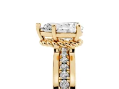 Pear Cut Diamond Solitaire Ring Set in Yellow gold with Channel Set Band and Prong Setting