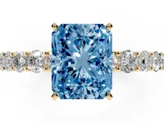 Fancy Blue Radiant Cut Diamond Solitaire Ring Set in Yellow gold with Shared Prong Pavé Band