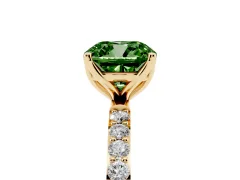 Fancy Green Cushion Cut Diamond Solitaire Engagement Ring Set in Yellow gold with Round Pavé Band and Prong Setting