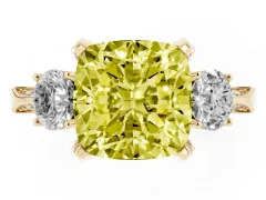 Fancy Yellow Cushion Cut Diamond Three-Stone Ring Set in Yellow gold with Pavé Band and Smaller Side Stones