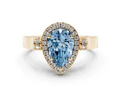 Fancy Blue Pear Cut Diamond Halo Ring Set in Yellow gold with Pavé-Lined Split Shank Band