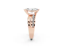 Marquise Cut Diamond Solitaire Ring Set in Rose gold with Channel Set Split Shank and Tension Prongs
