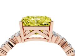 Fancy Yellow Radiant Cut Diamond Ring Set in Rose gold with Scattered Round Accents