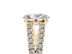 Oval Cut Diamond Split Shank Pavé Engagement Ring Set in Yellow gold with Prong-Held Center Stone