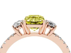 Fancy Yellow Emerald Cut Diamond Three-Stone Ring Set in Rose gold with Pavé Band and Graduated Sides