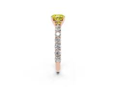 Fancy Yellow Cushion Cut Diamond Solitaire Ring Set in Rose gold with Shared Prong Pavé Band