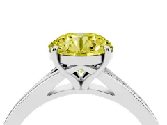 Fancy Yellow Round Cut Diamond Solitaire Ring Set in Platinum with Pavé Accent Band and Classic Prong Setting