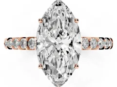 Marquise Cut Diamond Solitaire Engagement Ring Set in Rose gold with Pavé Band and Prong Setting