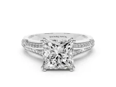 Princess Cut Diamond Split Shank Pavé Engagement Ring Set in Platinum with Prong-Set Center Stone