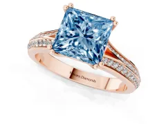Fancy Blue Princess Cut Diamond Split Shank Pavé Engagement Ring Set in Rose gold with Prong-Set Center Stone