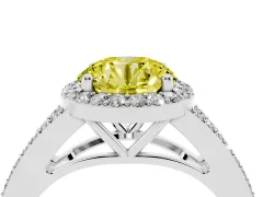 Fancy Yellow Round Cut Diamond Halo Split Shank Ring Set in White gold with Accent Stones and Prong Setting