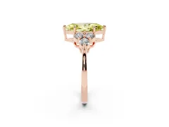 Fancy Yellow Marquise Cut Diamond Solitaire Ring Set in Rose gold with Cluster Accents on Each Side