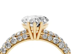 Heart Cut Diamond Pavé Band Solitaire Ring Set in Yellow gold with Close-Set Accent Stones and Prong Setting
