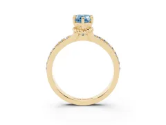 Fancy Blue Pear Cut Diamond Solitaire Ring Set in Yellow gold with Channel Set Band and Prong Setting