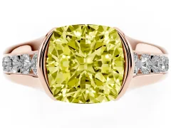 Fancy Yellow Cushion Cut Diamond Bezel-Set Solitaire Ring Set in Rose gold with Channel-Set Band