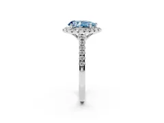 Fancy Blue Pear Cut Diamond Pavé Halo Engagement Ring Set in Platinum with Pavé Band and Prong Setting
