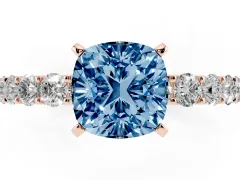 Fancy Blue Cushion Cut Diamond Solitaire Ring Set in Rose gold with Shared Prong Pavé Band