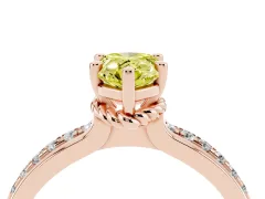 Fancy Yellow Pear Cut Diamond Solitaire Ring Set in Rose gold with Channel Set Band and Prong Setting