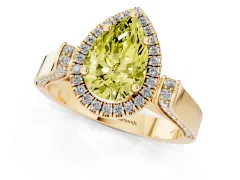 Fancy Yellow Pear Cut Diamond Halo Ring Set in Yellow gold with Pavé-Lined Split Shank Band