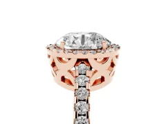 Round Cut Diamond Halo Ring Set in Rose gold with Pavé Shoulders and Halo-Framed Center