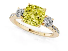 Fancy Yellow Cushion Cut Diamond Three-Stone Ring Set in Yellow gold with Pavé Band and Graduated Sides
