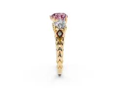 Fancy Pink Heart Cut Diamond Three-Stone Ring Set in Yellow gold with Braided Band