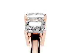 Princess Cut Diamond Three-Stone Ring Set in Rose gold with Channel-Set Band and Prong Settings