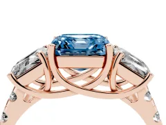 Fancy Blue Asscher Cut Diamond Three-Stone Ring Set in Rose gold with Pavé Band