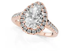 Pear Cut Diamond Pavé Halo Engagement Ring Set in Rose gold with Pavé Band and Prong Setting