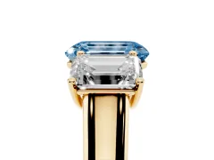 Fancy Blue Emerald Cut Diamond Three-Stone Ring Set in Yellow gold with Plain Polished Band