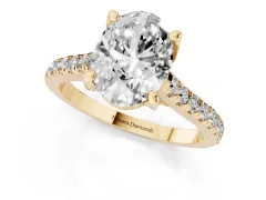 Oval Cut Diamond Solitaire Ring Set in Yellow gold with Brilliant Pavé Band and Prong Setting