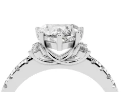 Heart Cut Diamond Three-Stone Pavé Ring Set in Platinum with Prong Setting