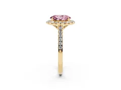 Fancy Pink Oval Cut Diamond Pavé Halo Engagement Ring Set in Yellow gold with Pavé Band and Prong Setting