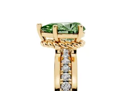 Fancy Green Pear Cut Diamond Solitaire Ring Set in Yellow gold with Channel Set Band and Prong Setting