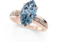 Fancy Blue Marquise Cut Diamond Solitaire Ring Set in Rose gold with Channel Set Band and Prong Setting