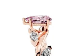 Fancy Pink Pear Cut Diamond Solitaire Ring Set in Rose gold with Twisted Marquise Accent Band