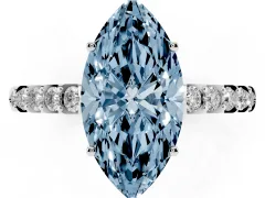 Fancy Blue Marquise Cut Diamond Solitaire Engagement Ring Set in White gold with Pavé Band and Prong Setting