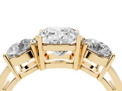 Cushion Cut Diamond Three-Stone Ring Set in Yellow gold with Round Side Stones and Classic Band