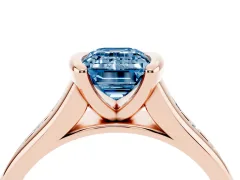 Fancy Blue Emerald Cut Diamond Bezel-Set Solitaire Ring Set in Rose gold with Channel-Set Band