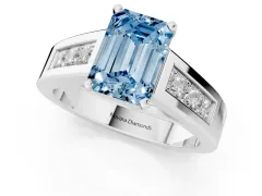 Fancy Blue Emerald Cut Diamond Solitaire Ring Set in White gold with Channel-Set Accent Stones and Prong Setting