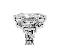 Marquise Cut Diamond Three-Stone Ring Set in White gold with Pavé Band