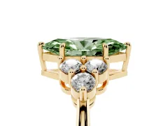 Fancy Green Marquise Cut Diamond Solitaire Ring Set in Yellow gold with Cluster Accents on Each Side